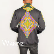 Dashiki Hoodie Jacket featuring a black body with a vibrant yellow, purple, and green traditional ornate pattern on the front bodice, kangaroo pocket, and outer sleeve lines