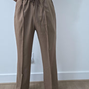 Dune caramel two-piece set featuring a short-sleeved V-neck tunic and matching straight-leg trousers with a sharp front crease. -Pant Full view