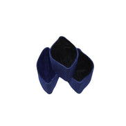 Kufi Hat featuring a dark velvet interior and a striking metallic cobalt blue crisscross weave pattern across the structured exterior.