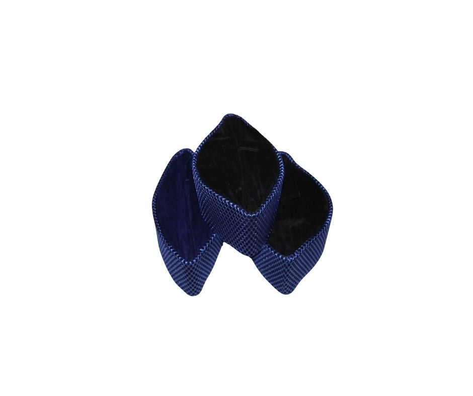Kufi Hat featuring a dark velvet interior and a striking metallic cobalt blue crisscross weave pattern across the structured exterior.