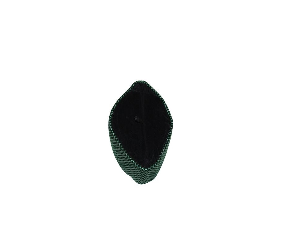 Kufi Hat featuring a dark velvet interior and a striking emerald green metallic crisscross weave across the entire exterior.