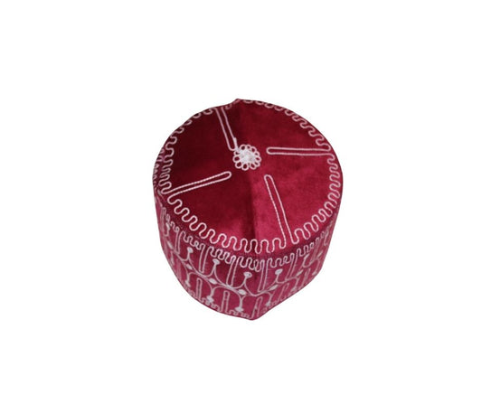 Ado Kufi Hat featuring a deep garnet red body with white circular and linear embroidered patterns