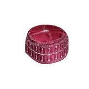 Ado Kufi Hat featuring a deep garnet red body with white circular and linear embroidered patterns