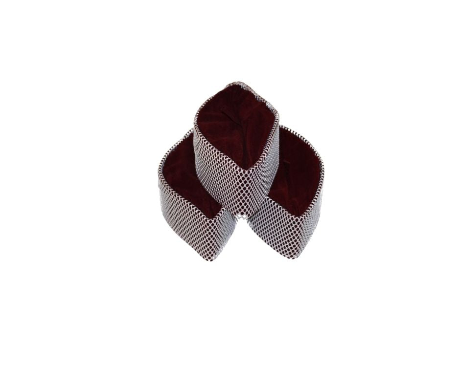 Kufi Hat featuring a burgundy velvet interior and a contrasting ivory white crisscross grid pattern across the exterior.