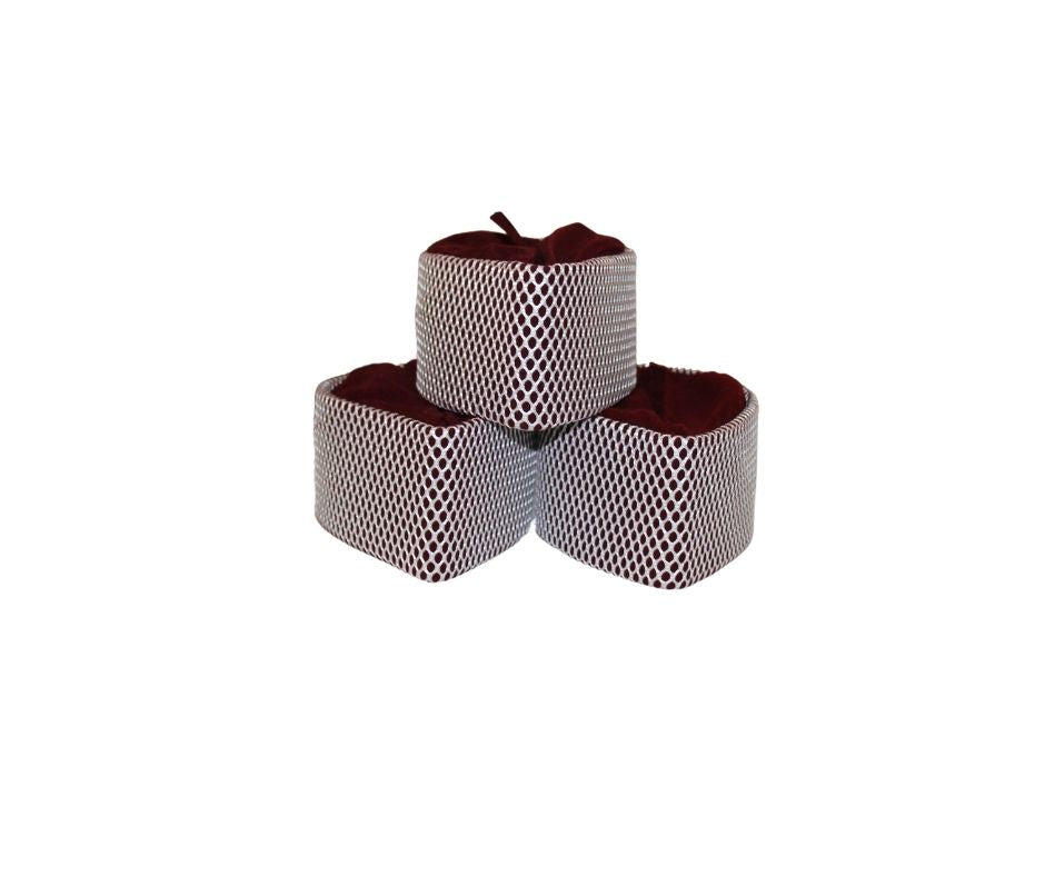 Kufi Hat featuring a burgundy velvet interior and a contrasting ivory white crisscross grid pattern across the exterior.