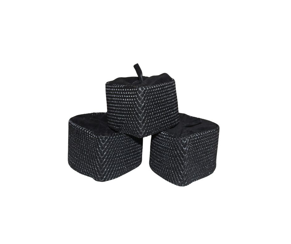 Kufi Hat featuring a black velvet base with a silver metallic crisscross weave pattern and a traditional flat-top crown.