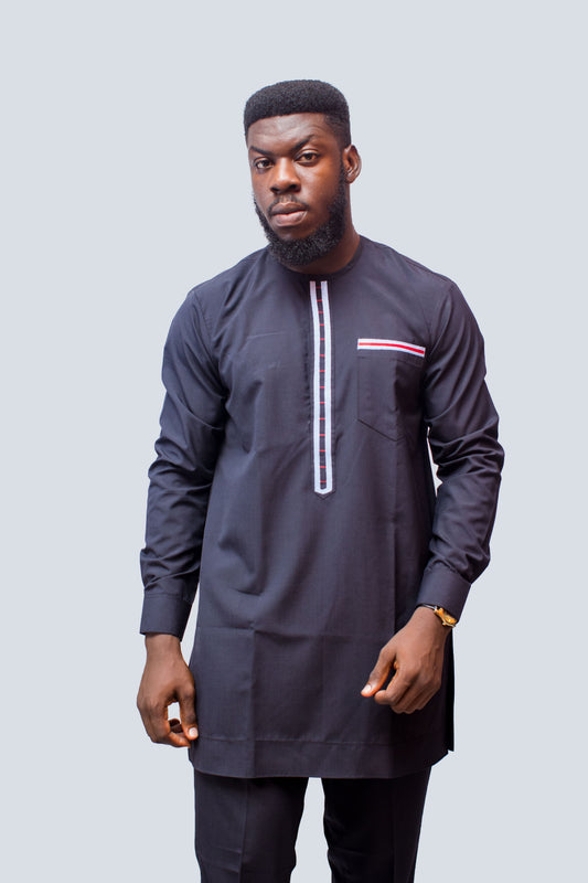 African Men's Suit featuring a longline navy blue tunic with a round neckline, a central vertical white placket detail accented by light blue and red threading, a matching decorated chest pocket welt, and tailored coordinating trousers