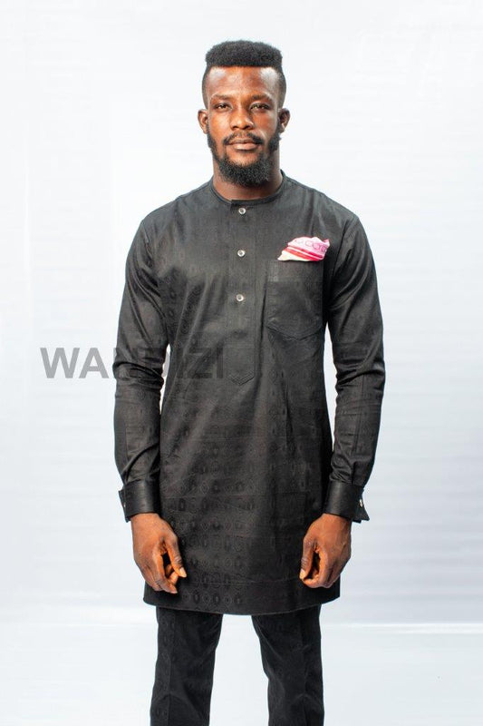 African Men's Suit featuring a longline black patterned jacquard tunic with a band collar, buttoned placket, a single patch pocket on the chest, and coordinating tailored trousers