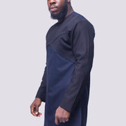 African Men's Suit featuring a longline dark tunic with a criss-cross textured black net fabric paneled across the upper chest and sleeves, paired with tailored coordinating trousers