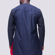 African Men's Suit featuring a longline dark tunic with a criss-cross textured black net fabric paneled across the upper chest and sleeves, paired with tailored coordinating trousers