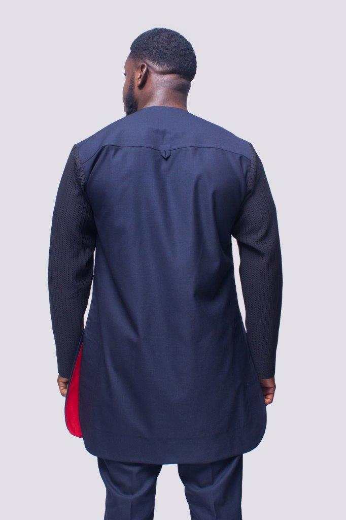African Men's Suit featuring a longline dark tunic with a criss-cross textured black net fabric paneled across the upper chest and sleeves, paired with tailored coordinating trousers