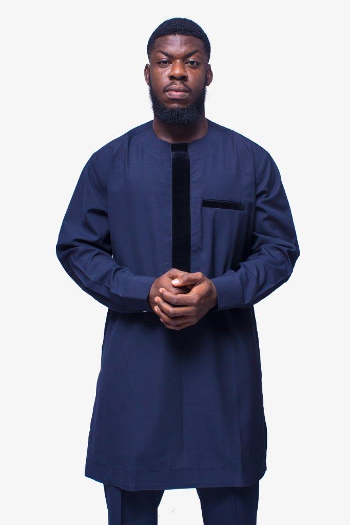 African Men's Suit featuring a longline deep blue tunic with a round neckline, a distinctive central vertical black velvet panel, a velvet-accented chest pocket, and tailored matching trousers