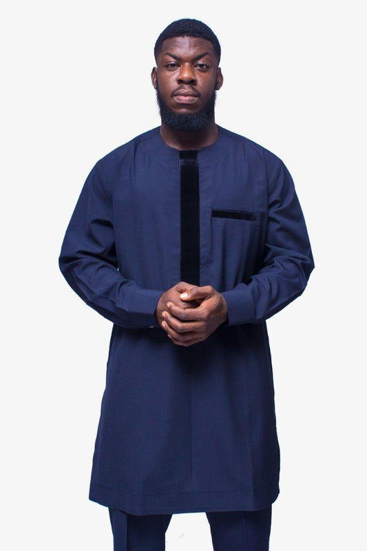 African Men's Suit featuring a longline deep blue tunic with a round neckline, a distinctive central vertical black velvet panel, a velvet-accented chest pocket, and tailored matching trousers
