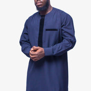 African Men's Suit featuring a longline deep blue tunic with a round neckline, a distinctive central vertical black velvet panel, a velvet-accented chest pocket, and tailored matching trousers