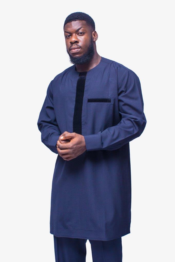 African Men's Suit featuring a longline deep blue tunic with a round neckline, a distinctive central vertical black velvet panel, a velvet-accented chest pocket, and tailored matching trousers