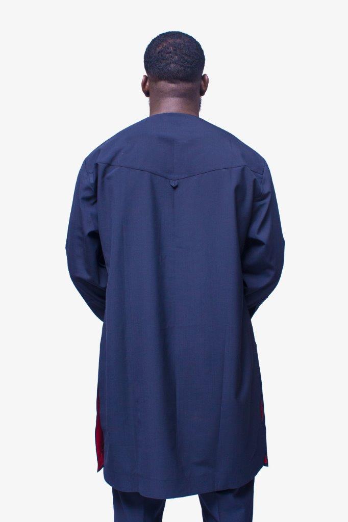 African Men's Suit featuring a longline deep blue tunic with a round neckline, a distinctive central vertical black velvet panel, a velvet-accented chest pocket, and tailored matching trousers
