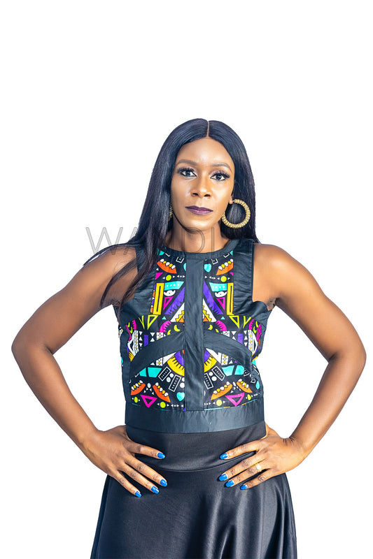 Ankara Top featuring a sleeveless, high-neck crop silhouette with a vibrant purple, yellow, and turquoise geometric neon pattern enclosed within bold black structural borders