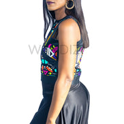 Ankara Top featuring a sleeveless, high-neck crop silhouette with a vibrant purple, yellow, and turquoise geometric neon pattern enclosed within bold black structural borders