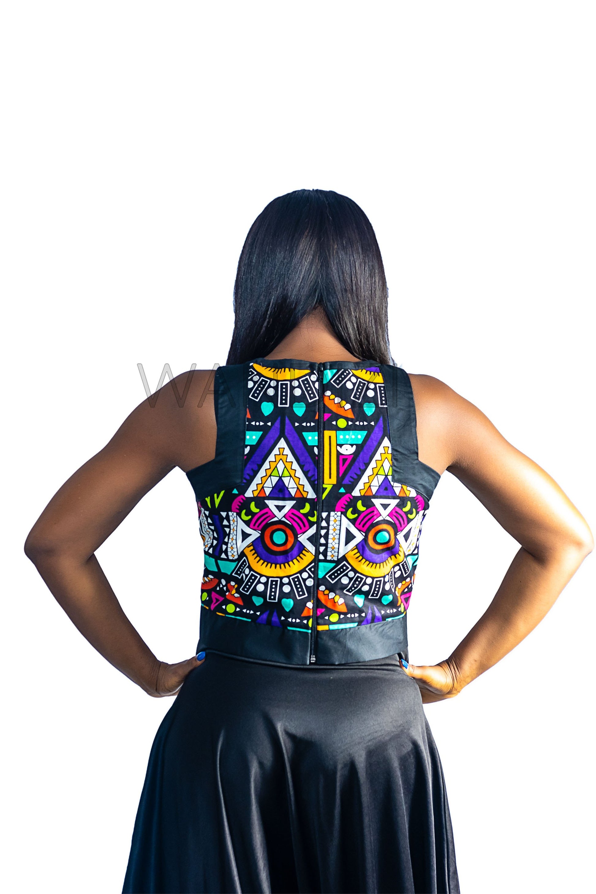 Ankara Top featuring a sleeveless, high-neck crop silhouette with a vibrant purple, yellow, and turquoise geometric neon pattern enclosed within bold black structural borders