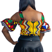 Ankara Top featuring a cold-shoulder crop silhouette with elasticated flare sleeves in a colorful geometric print with yellow, blue, red, and green diamond and triangle motifs