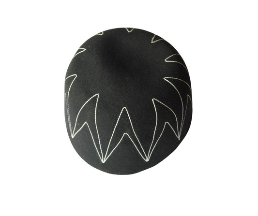 Awo Cap featuring a black wool body with white zigzag zenith stitching