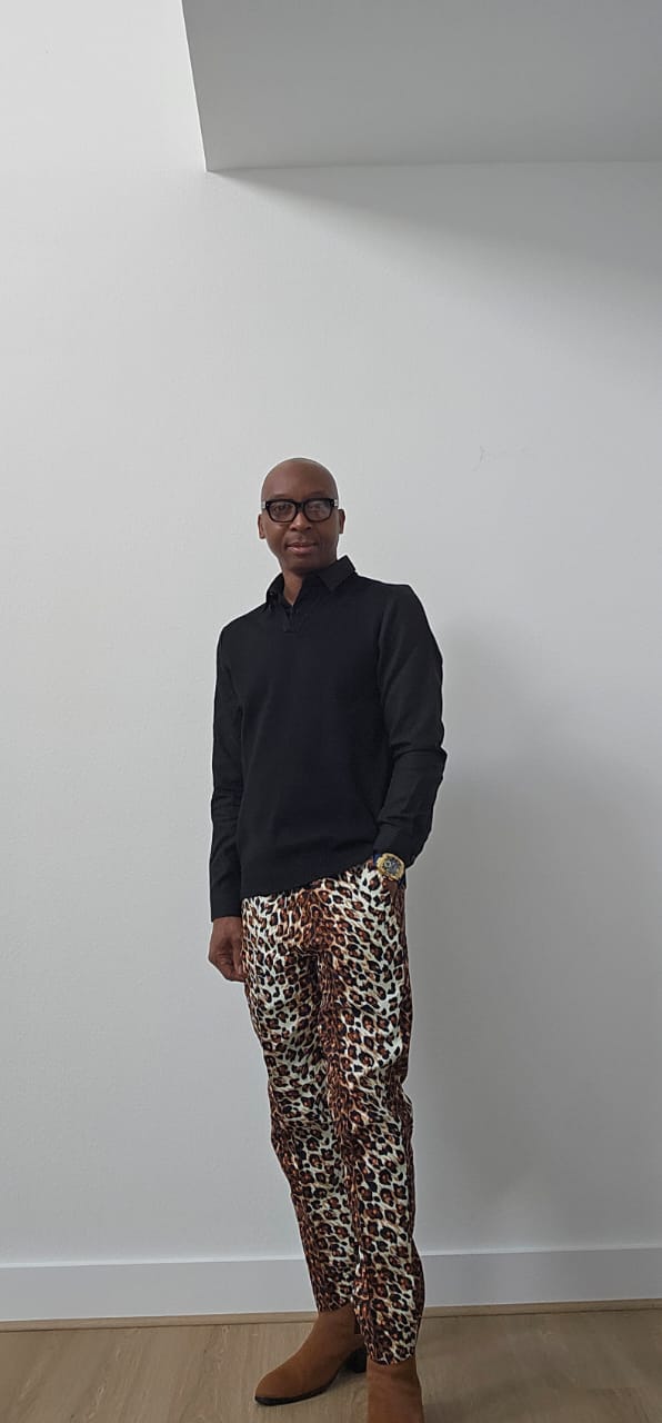 Chiseled Trousers featuring a bold leopard print pattern with a tapered, tailored fit