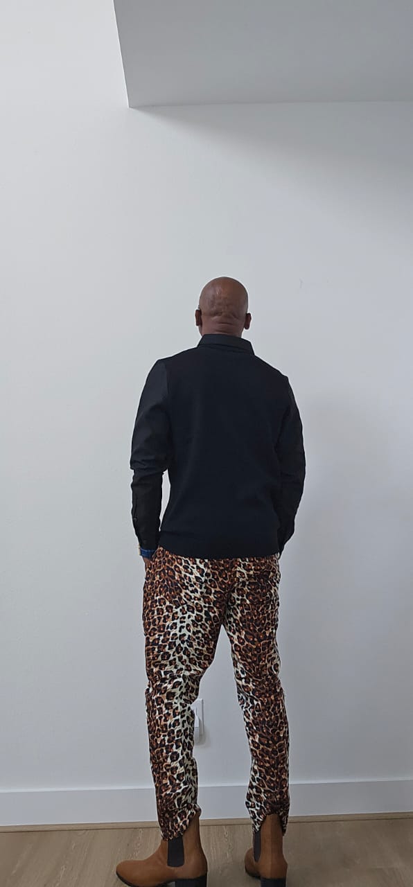 Chiseled Trousers featuring a bold leopard print pattern 