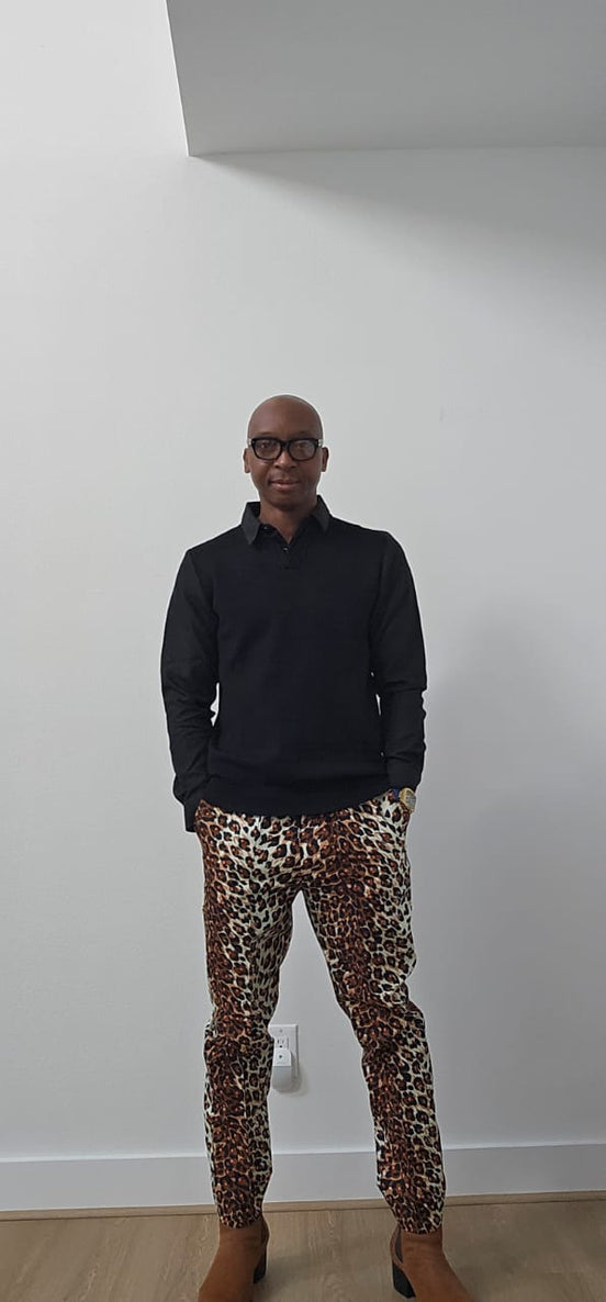 Chiseled Trousers featuring a bold leopard print pattern with a tapered, tailored fit