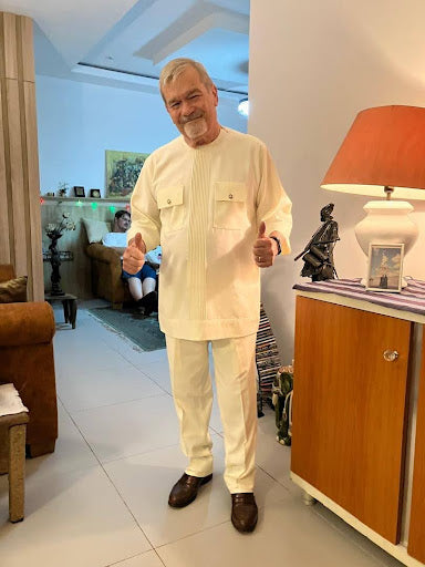 Customer Photo . A man wearing a traditional African Suit