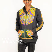 Dashiki Hoodie Jacket featuring a black body with a vibrant yellow, purple, and green traditional ornate pattern on the front bodice, kangaroo pocket, and outer sleeve lines