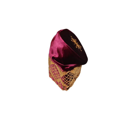 Fila Cap featuring burgundy velvet with a gold starburst on the crown and a geometric lattice embroidery pattern around the base.