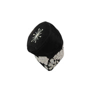 Fila Cap featuring black velvet with silver starburst beading on the crown and intricate leaf-inspired stone patterns around the base.