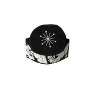 Fila Cap featuring black velvet with silver starburst beading on the crown and intricate leaf-inspired stone patterns around the base.