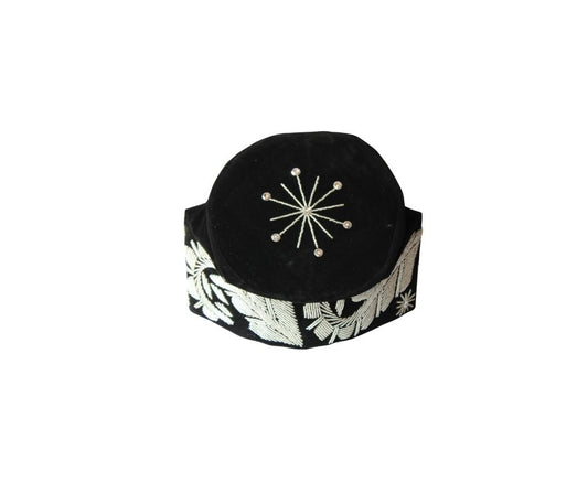 Fila Cap featuring black velvet with silver starburst beading on the crown and intricate leaf-inspired stone patterns around the base.