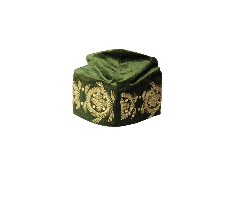 Fila Cap featuring olive green velvet with a central gold starburst and flowing gold leaf embroidery around the base.