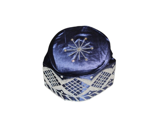 Fila Cap featuring deep blue velvet with a central silver starburst and a geometric lattice pattern around the base.