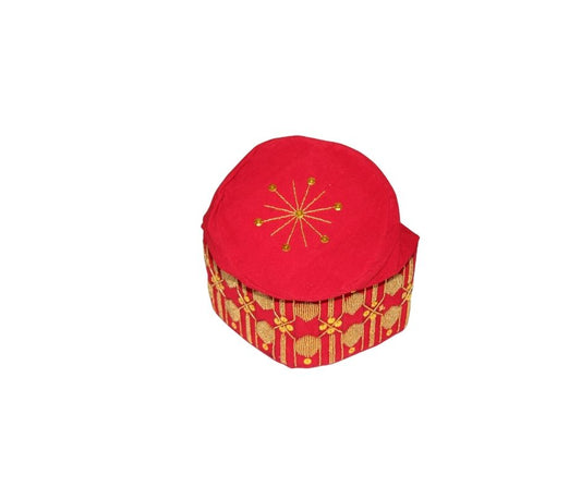 Fila Cap featuring a rich red velvet crown with a central gold starburst and a geometric gold pattern around the base.