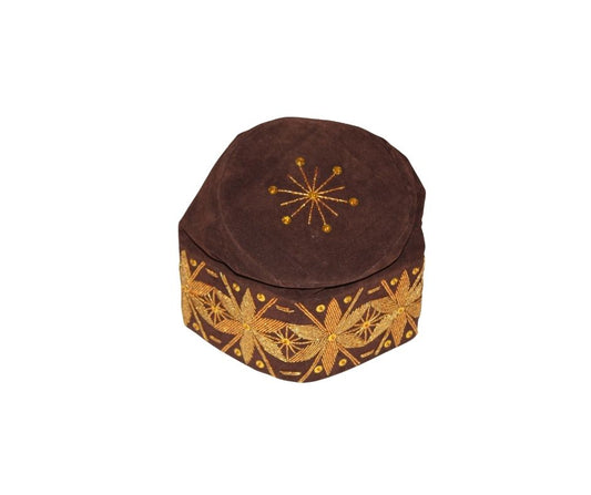 Fila Cap featuring deep brown velvet with a central gold starburst and a continuous gold floral-geometric pattern around the base.