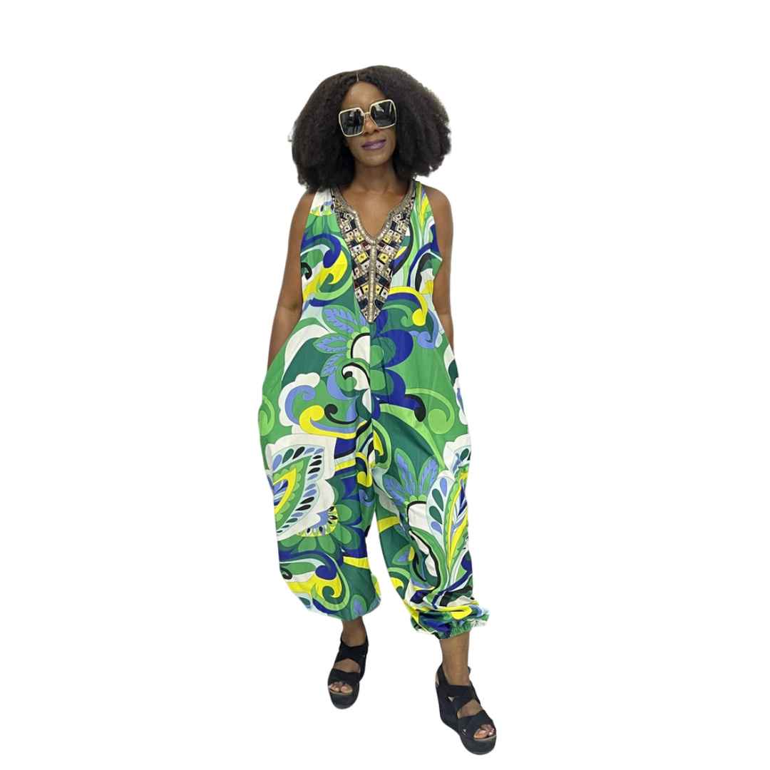 Harem Jumpsuit featuring a green botanical print, beaded V-neckline, and a voluminous drop-crotch silhouette.