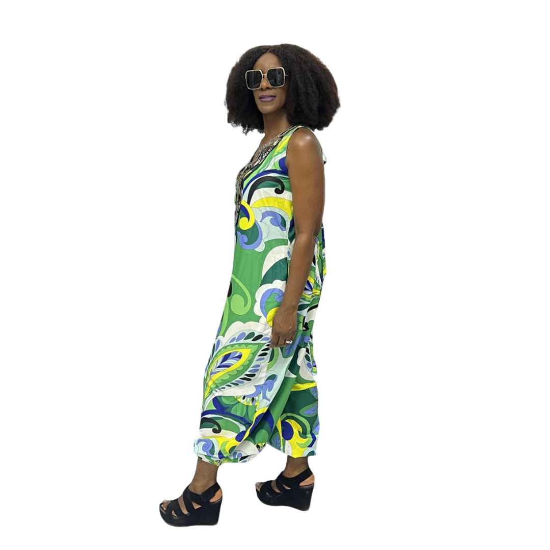Harem Jumpsuit featuring a green botanical print, beaded V-neckline, and a voluminous drop-crotch silhouette.