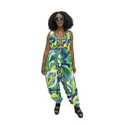 Harem Jumpsuit featuring a green botanical print, beaded V-neckline, and a voluminous drop-crotch silhouette.