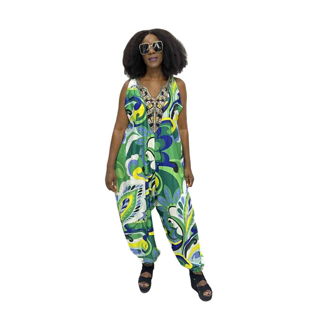Harem Jumpsuit featuring a green botanical print, beaded V-neckline, and a voluminous drop-crotch silhouette.
