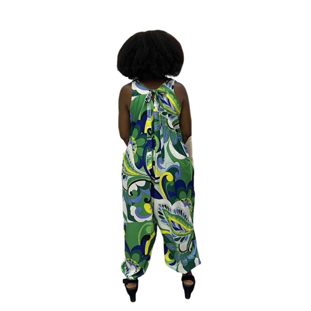 Harem Jumpsuit featuring a green botanical print, beaded V-neckline, and a voluminous drop-crotch silhouette.