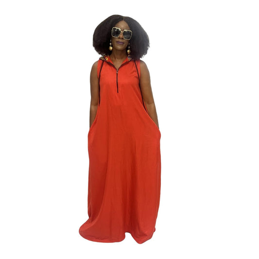Sleeveless orange maxi dress featuring a hooded neckline with multicolor pattern lining, front zip detail, and a voluminous floor-length skirt.
