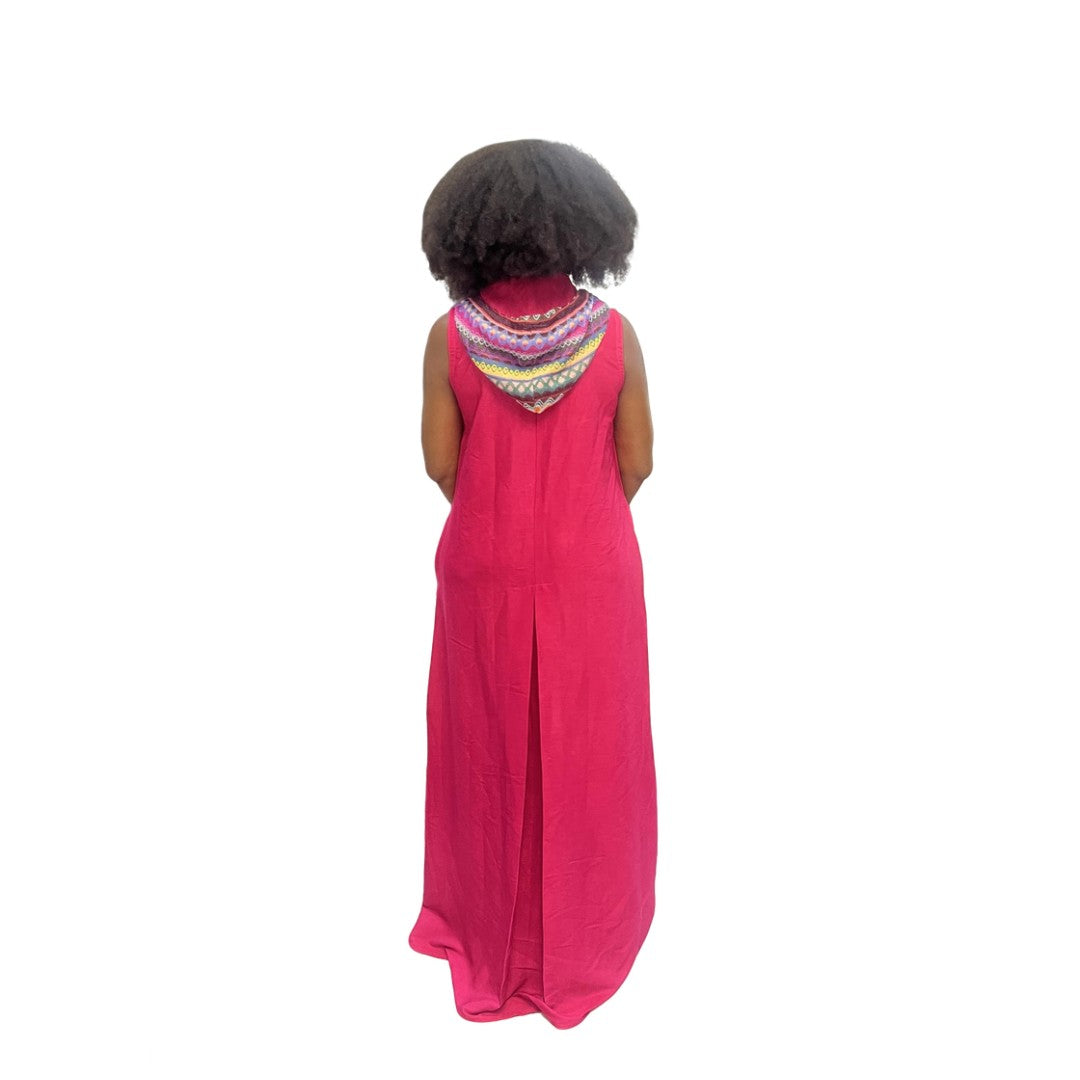 Sleeveless fuchsia maxi dress featuring a front zipper, side pockets, and a hoodie with a multicolor patterned lining.