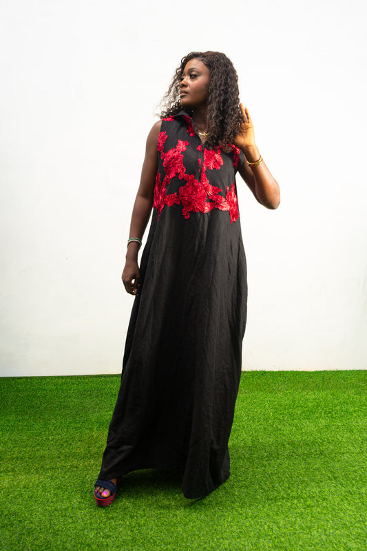 Black and Red Embroidery Jumpsuit  featuring a sleeveless black bodice with textured red floral embroidery and flowing wide-leg trousers.