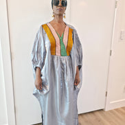 Luxury silver-grey Beaded Boubou Kaftan featuring a V-neckline with a colorful beaded mosaic pattern and voluminous sleeves.
