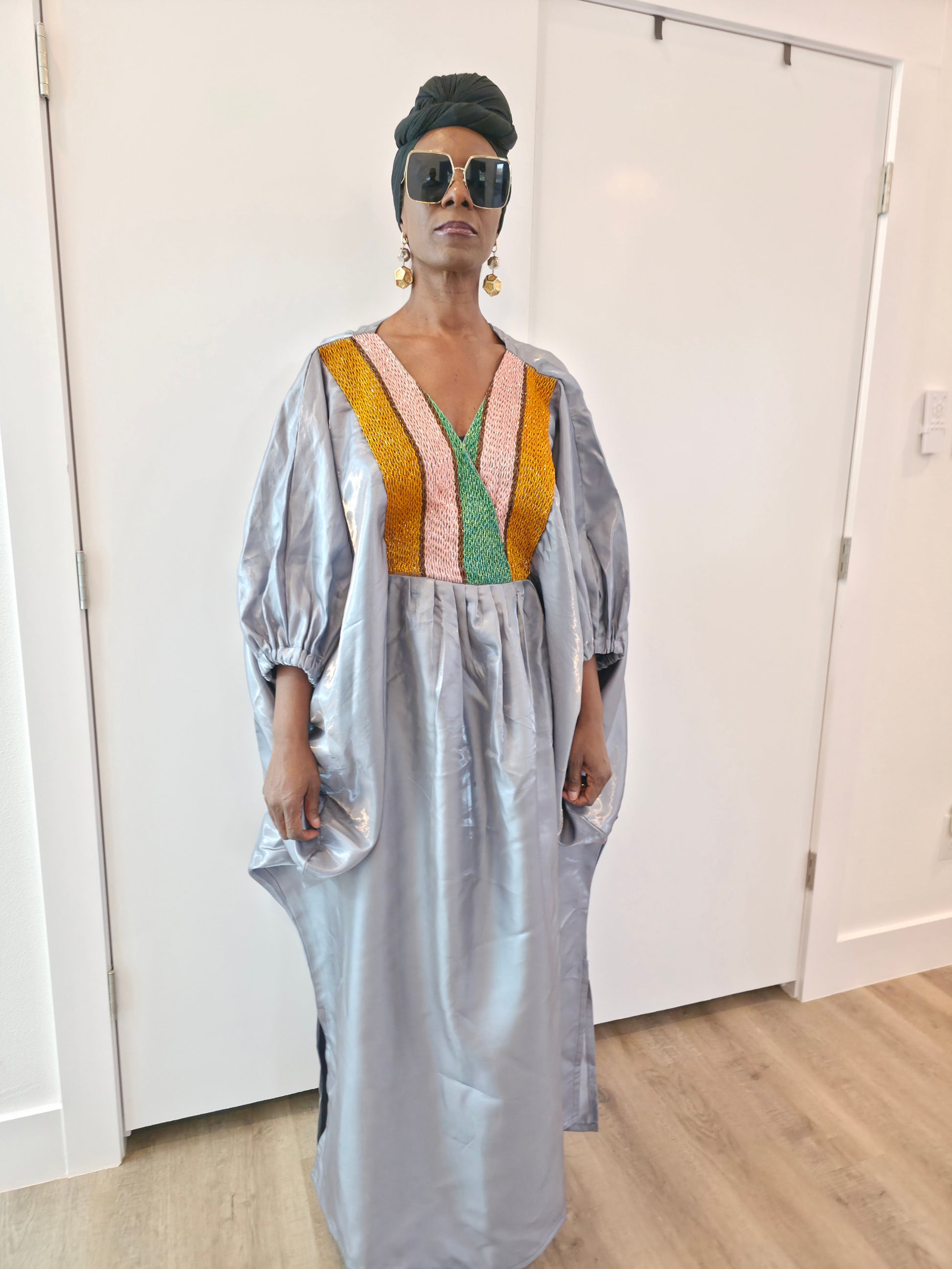 Luxury silver-grey Beaded Boubou Kaftan featuring a V-neckline with a colorful beaded mosaic pattern and voluminous sleeves.