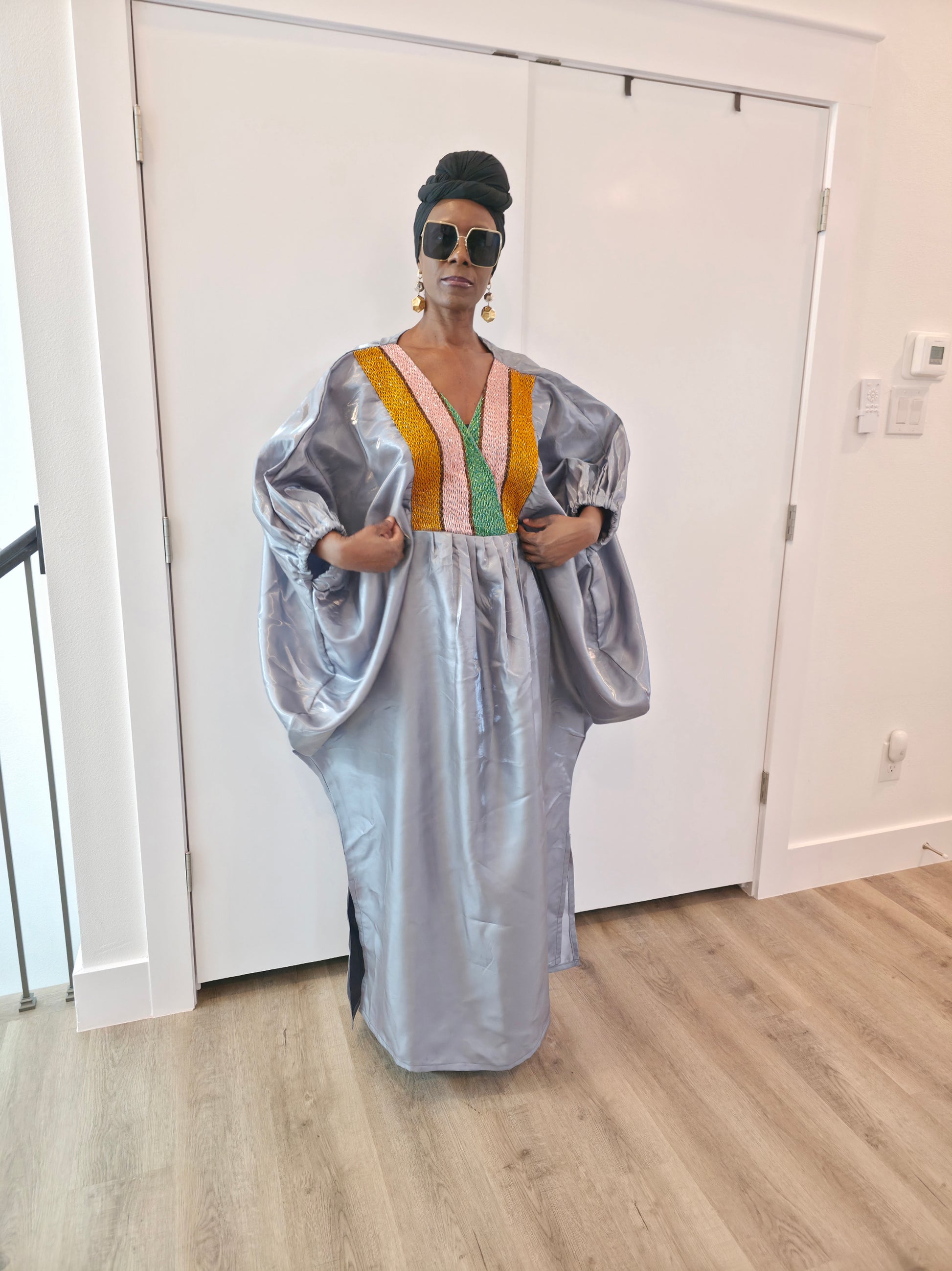 Luxury silver-grey Beaded Boubou Kaftan featuring a V-neckline with a colorful beaded mosaic pattern and voluminous sleeves.