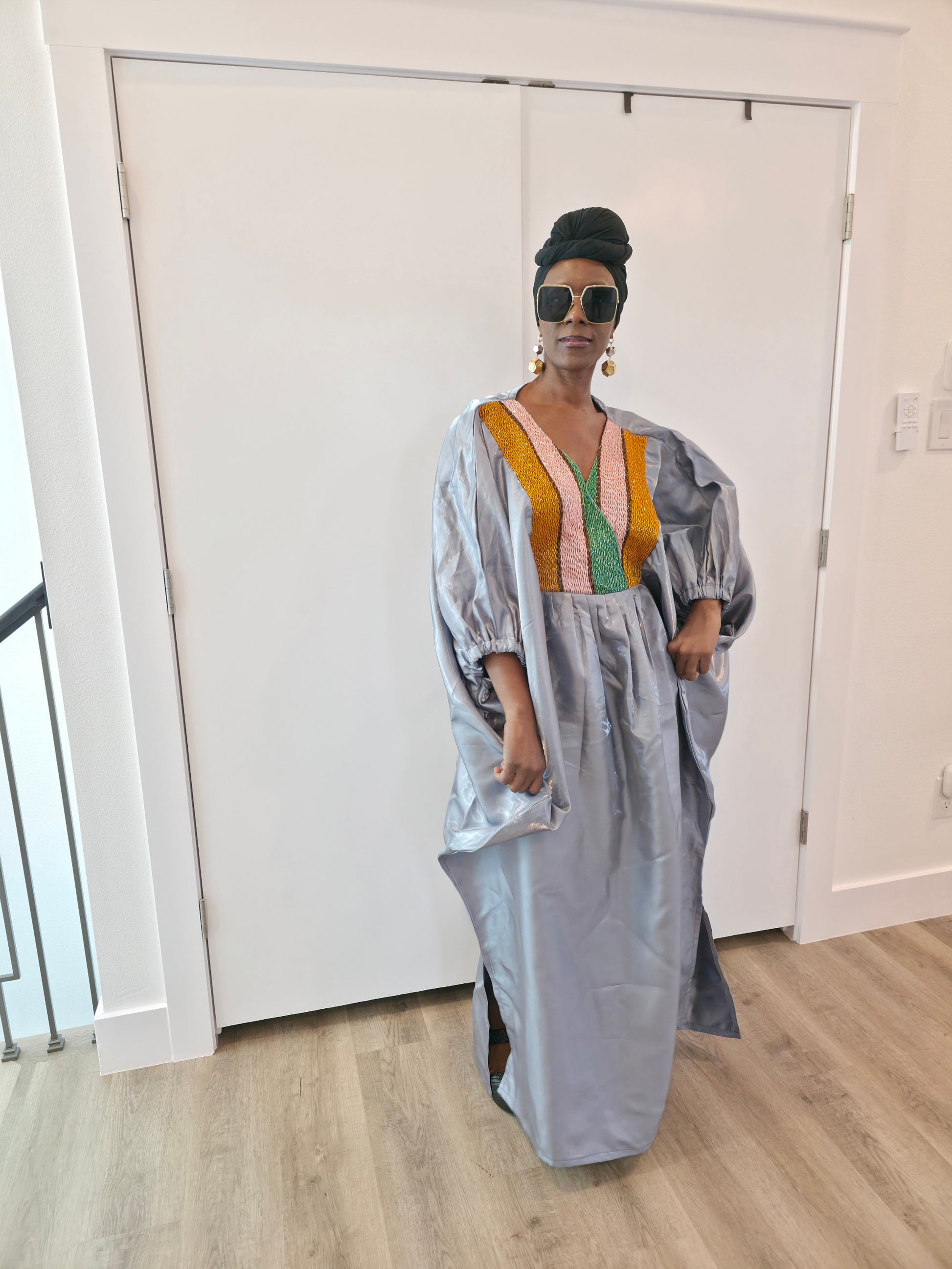 Luxury silver-grey Beaded Boubou Kaftan featuring a V-neckline with a colorful beaded mosaic pattern and voluminous sleeves.